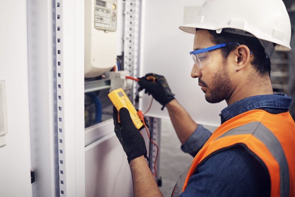 man performing electrical safety inspection