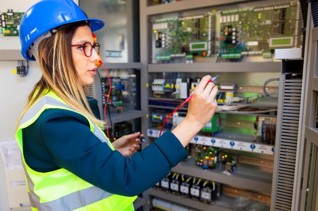 woman maintenance engineer checking board