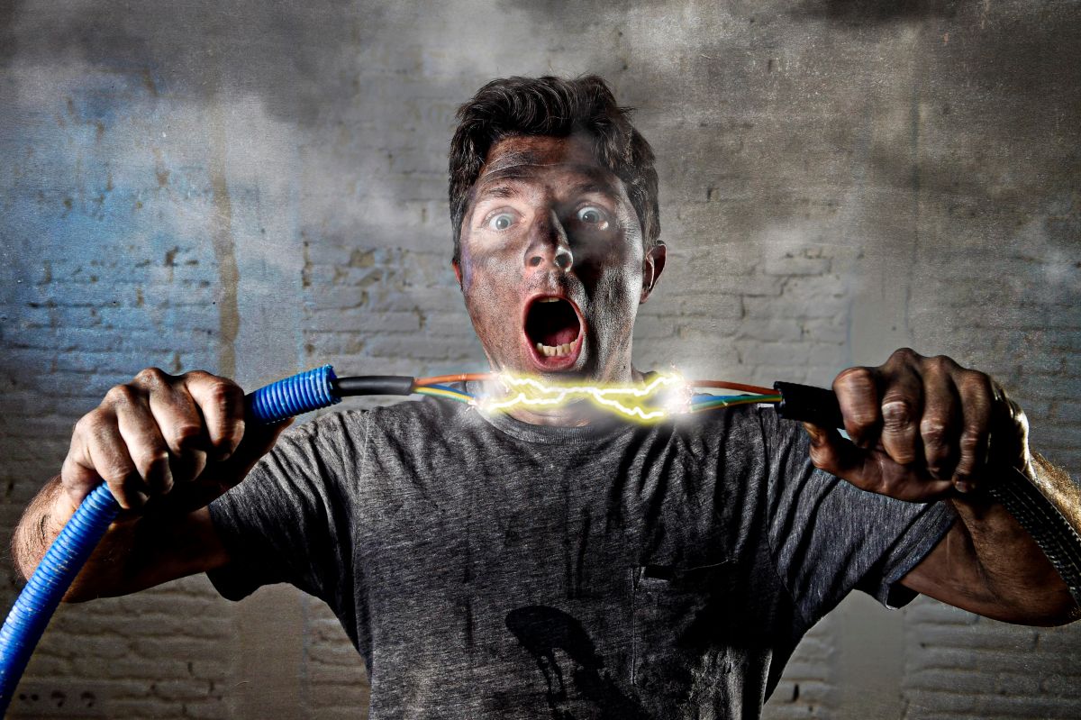 man getting electric shock